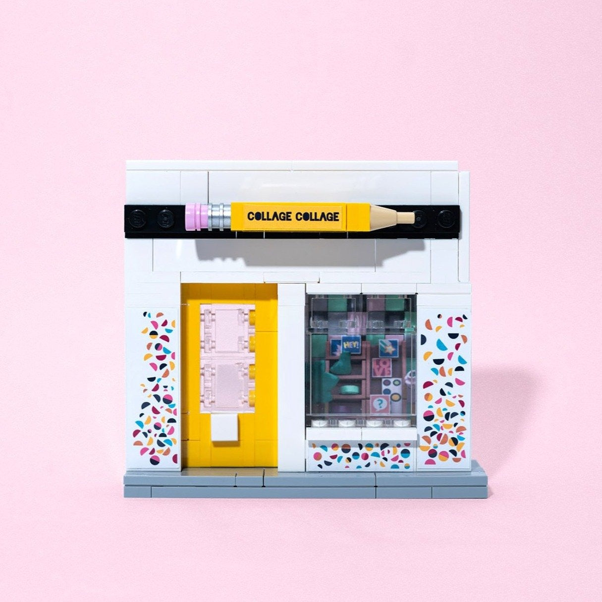 miniature replica of Collage Collage storefront built out of Lego Bricks