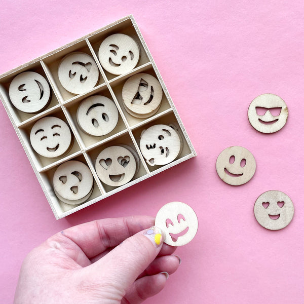 Mini unfinished Wood Emoji decor in a wooden box