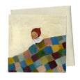 The Quilt Greeting Card with a small child sleeping under a big colorful quilt blanket