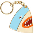 Keychain with a shark head in light blue with a red mouth and teeth, outlined in gold