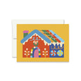 Greeting card with colorful house illustration on a yellow background.