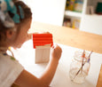 Painting a wooden birdhouse at collage collage