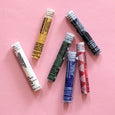 Face painting sticks in rainbow colors: White, Black, Red, Yellow, Blue, Green