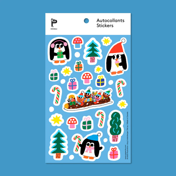 Sticker sheet with penguins wearing holiday hats holding candy canes and presents, along with pine trees, mushrooms, stars, and elves riding a log sleigh with presents.