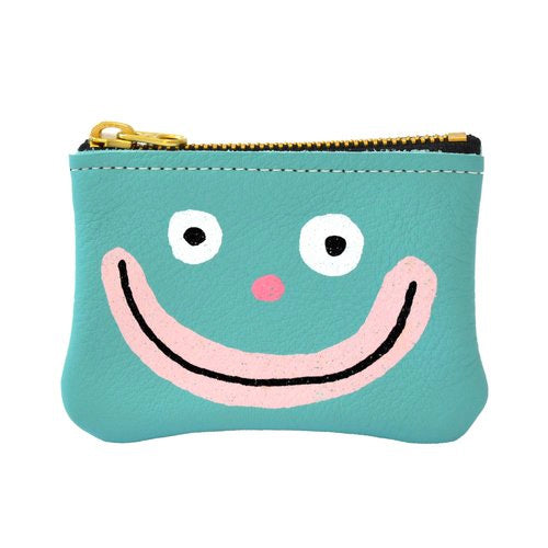Turquoise Guy Leather Cardholder with a illustration of a large smiling face