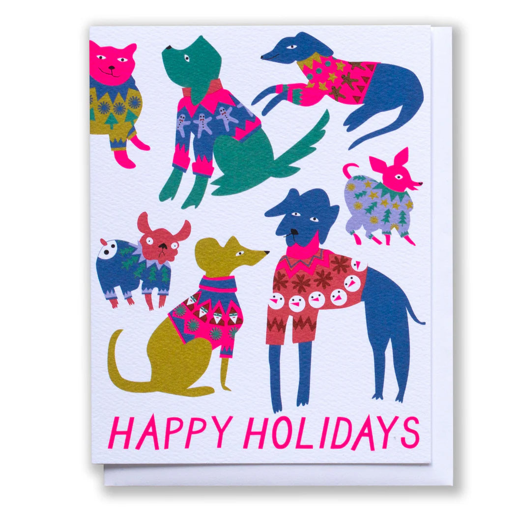 Holiday Christmas card with adorable dogs in multicoloured cheery Christmas sweaters and Happy Holidays in pink text at bottom