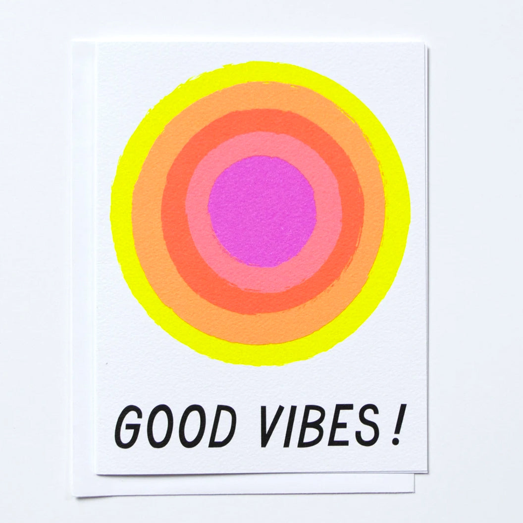 Greeting card with neon glowing sun and the text "Good Vibes" underneath by Banquet Workshop