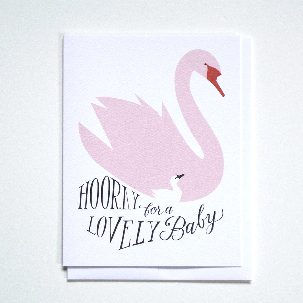 A greeting card with the text "Hooray for a lovely baby" featuring a mother swan and her baby by Banquet Workshop