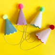 Set of 8 birthday party hats with pom poms by Meri Meri