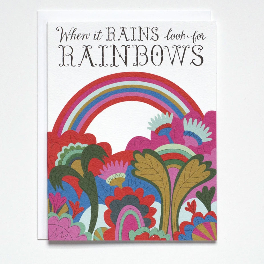 Greeting Card with modern flowers and rainbow illustration and the text "When it Rains look for Rainbows" by Banquet