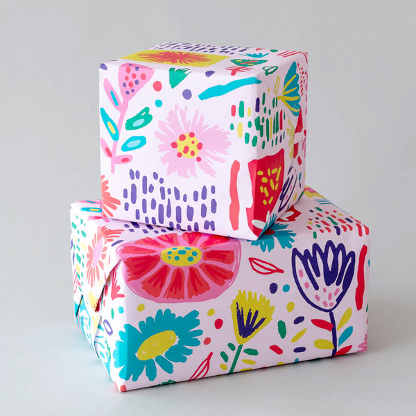 Flower Power Gift Wrap Sheet with bright flowers on a pink background