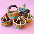 handmade bolga basket in multicolours with a leather handle