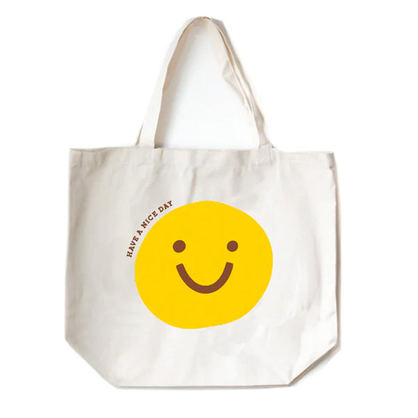 Natural Color Tote bag with a yellow happy face and the words "have a nice day"