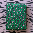 Wrapping Paper by Petra Boase in Leopard Print in green and pale pink colors