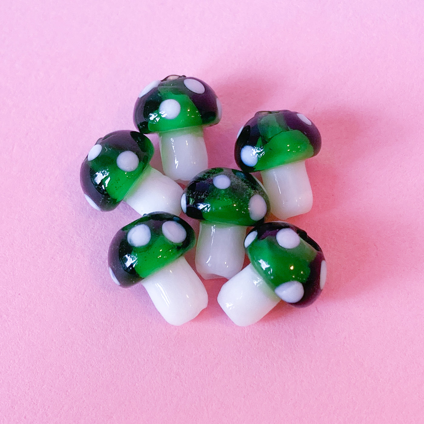Glass mushroom beads in green