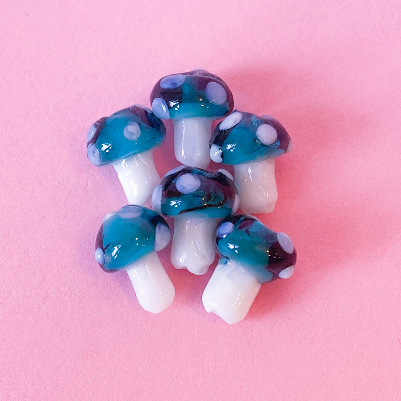Glass mushroom beads in turquoise