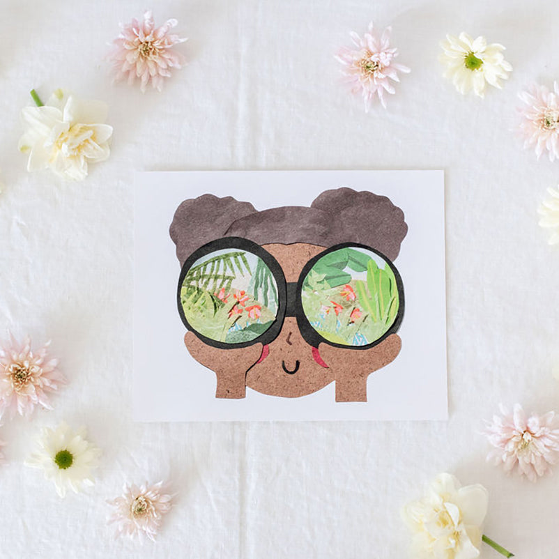 Neets Anita Cheung paper cut art print with a child looking though binoculars at a garden scene with flowers