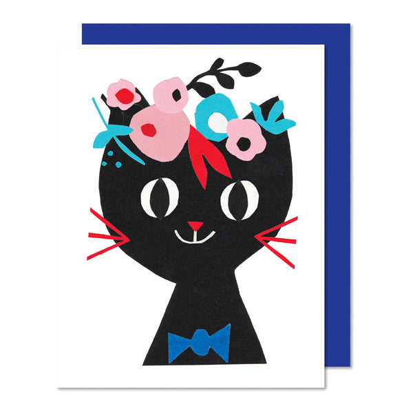 Paper Cat Greeting Card with a black cat with pink and blue flowers on their head, all in paper cut out shapes