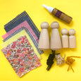 Peg Doll craft kit with farbic, glue, and string