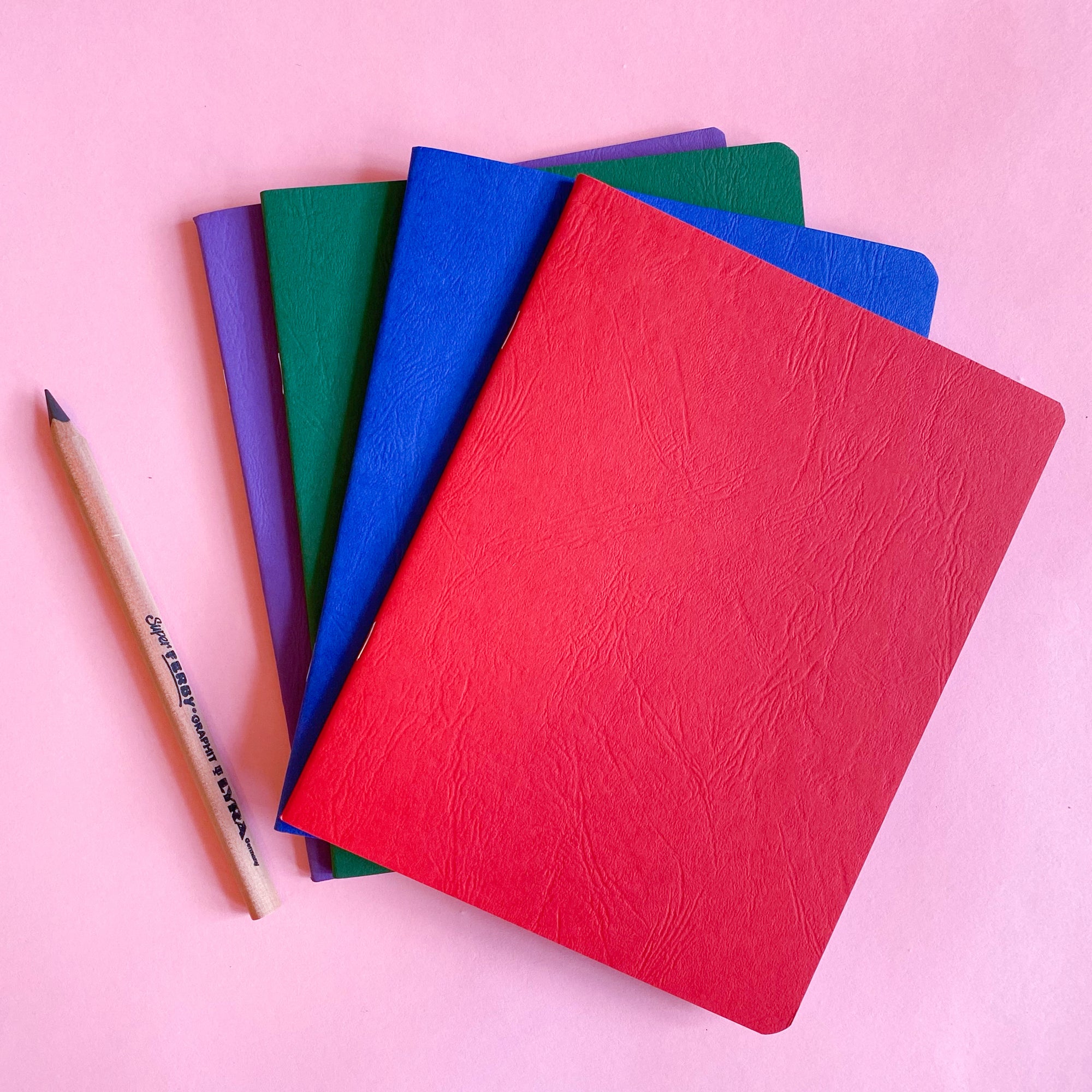 Sketchbook with blank and onion skin pages in small journal portrait size