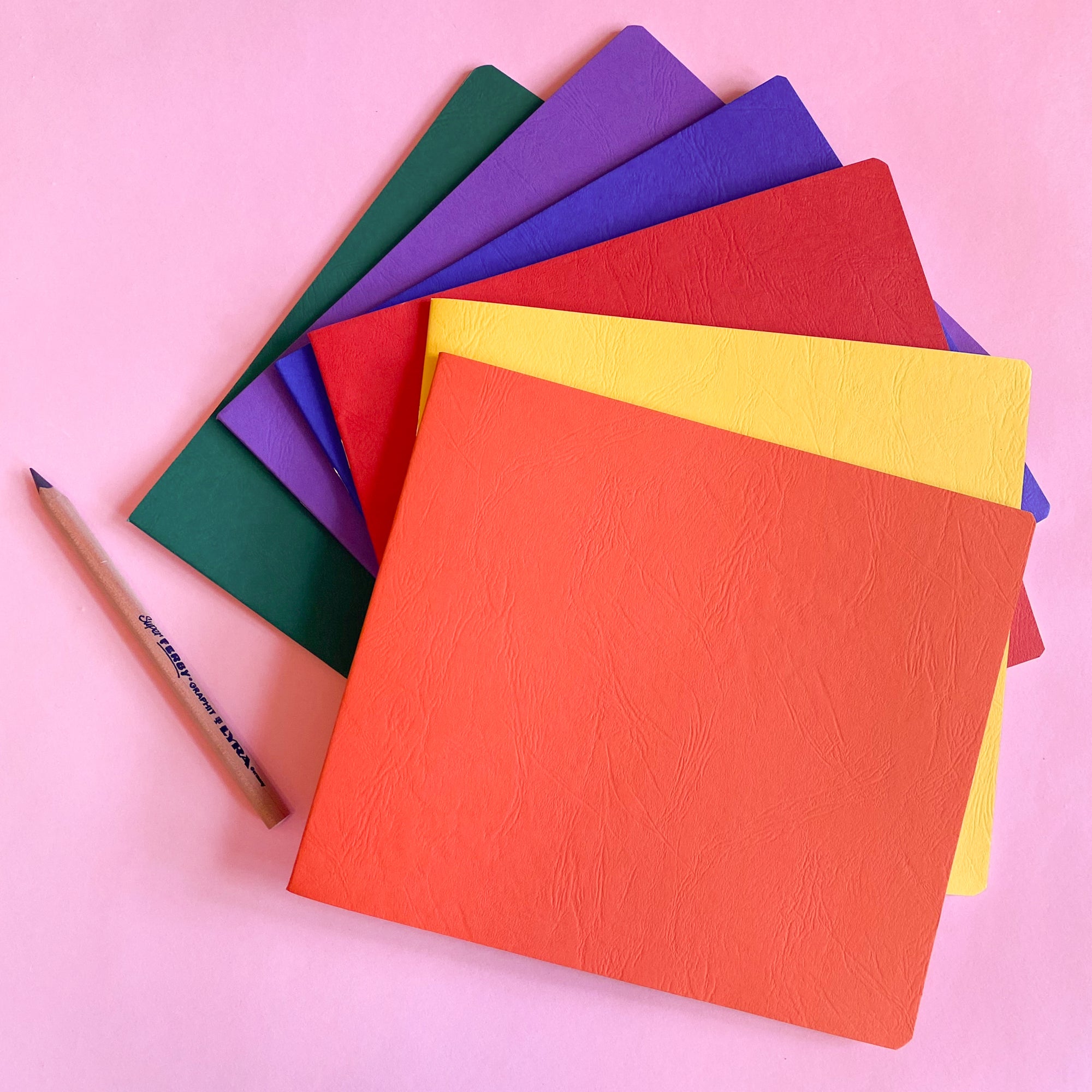 Sketchbook with blank and onion skin pages in small landscape size