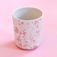 Reusable cups made of bamboo with a speckle pattern in shades of pinks