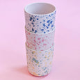 Reusable cups made of bamboo with a speckle pattern in shades of pinks, blues, and greens