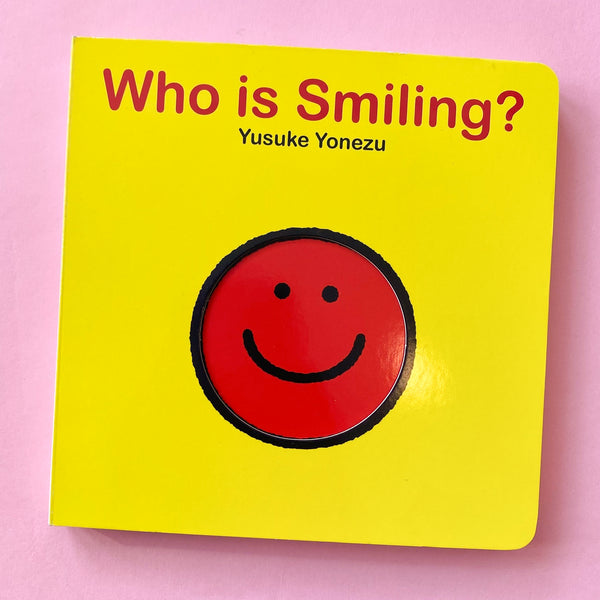 Who is Smiling?: An Interactive Book of Smiling Faces by Yusuke Yonezu