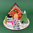 Wooden Cabin Craft Kit for Kids with 2 wooden snowmen, trees, and glue