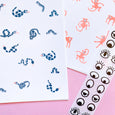 Writing paper with monkey and snake designs. They come with eye stickers and brown kraft envelopes.